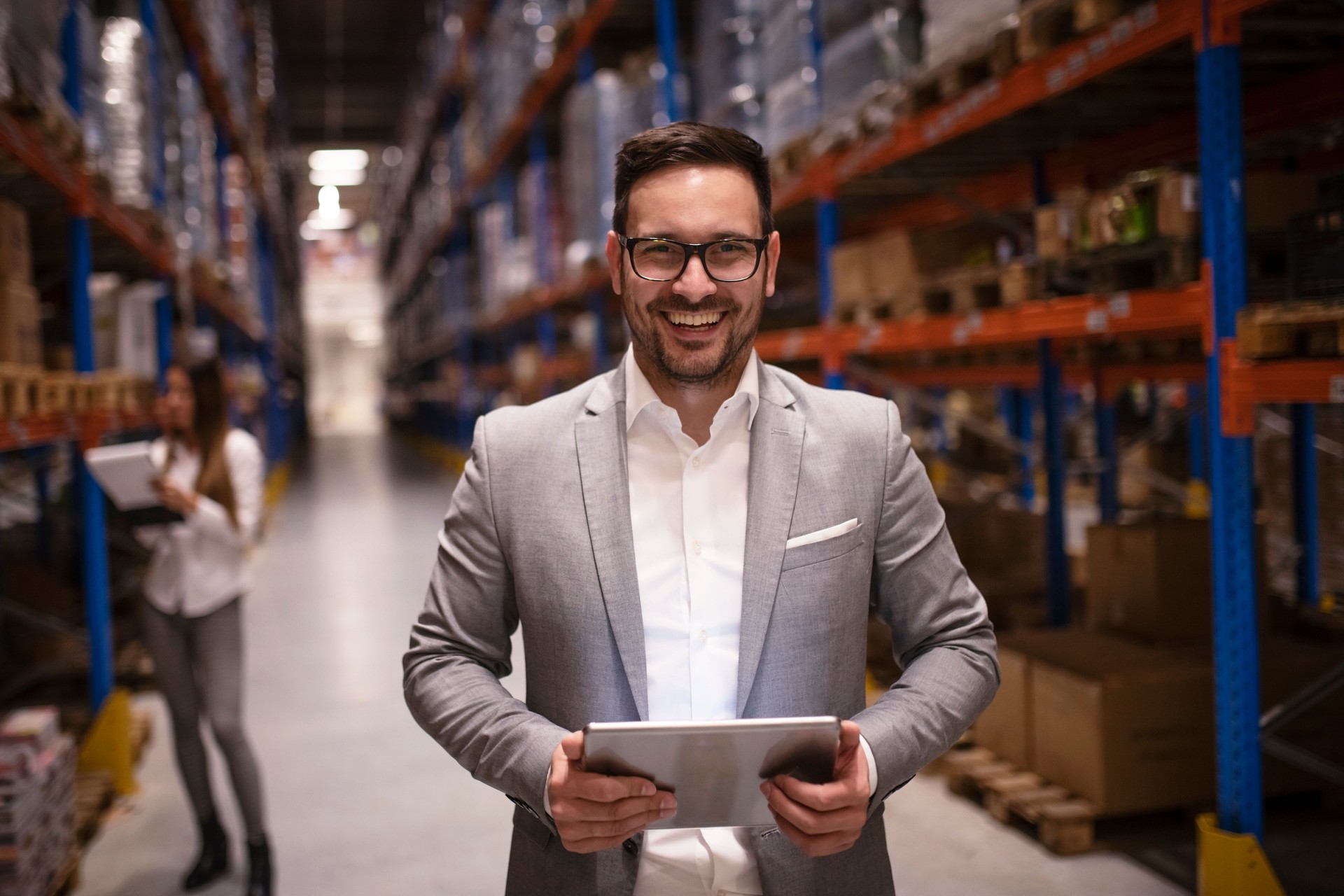 Portrait of successful manager at warehouse.